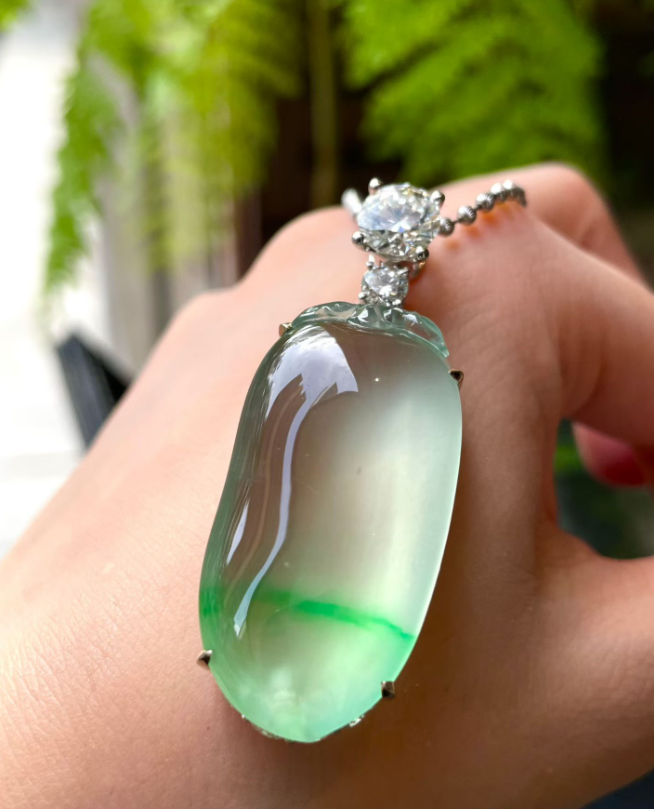 Glassy Floating Yang Green Jadeite Fu Gua Pendant